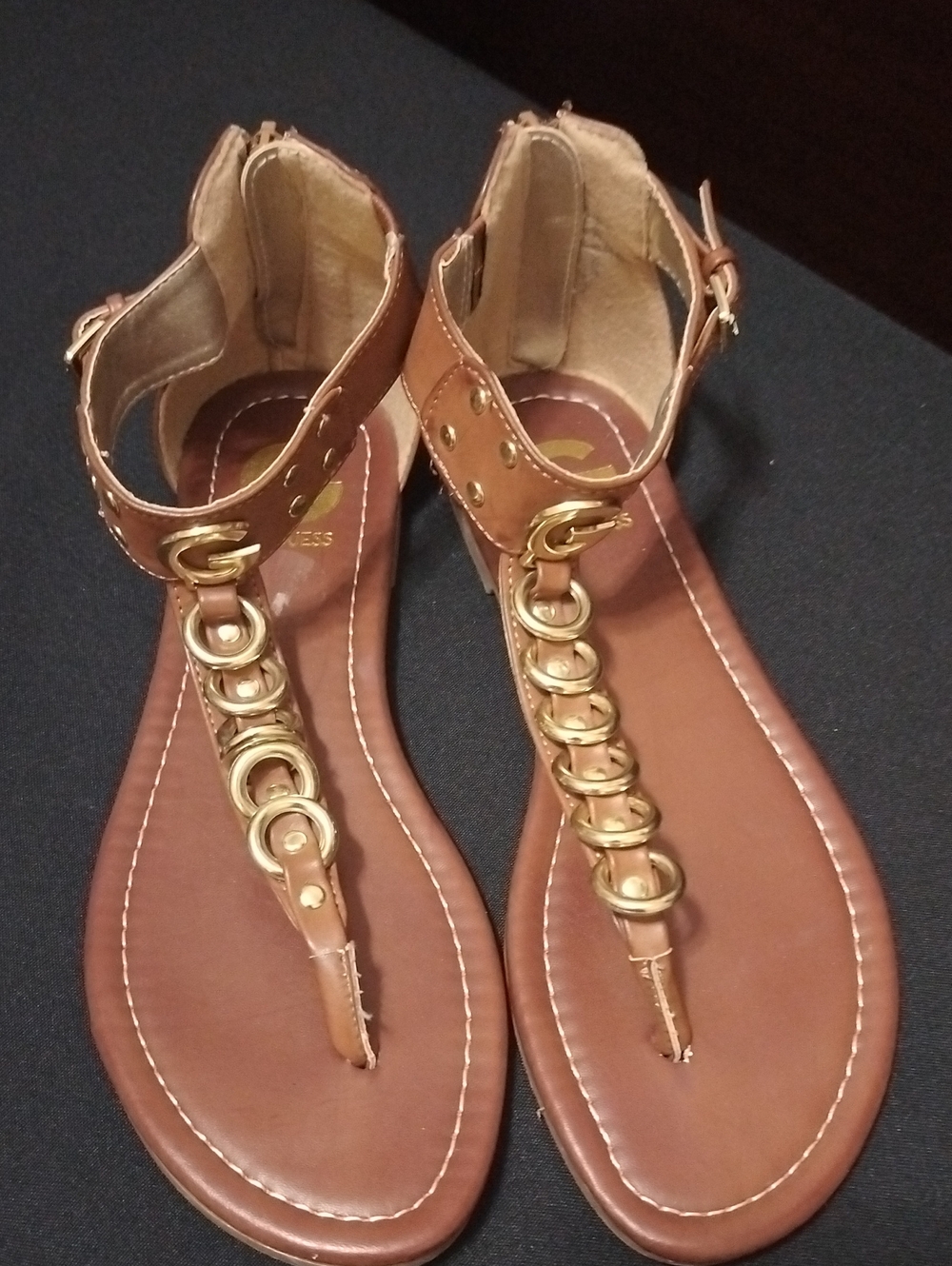Guess Brown T-Strap Sandals with Gold Ring Accents